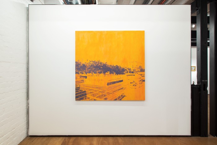 big orange square painting with grey landscape painted over the top.